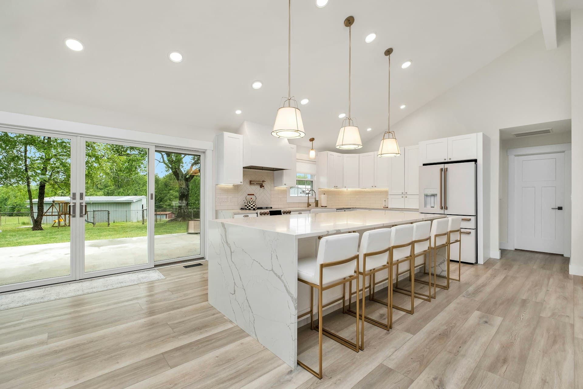 Spacious modern kitchen with marble island
