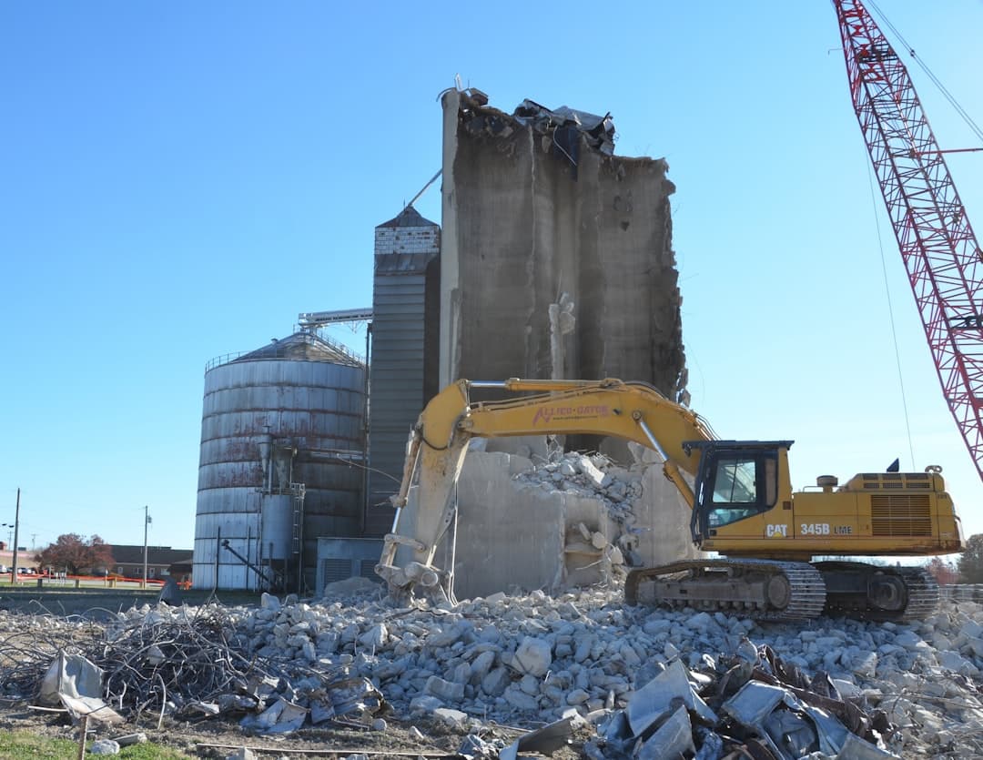 Excavator demolishing a building structure