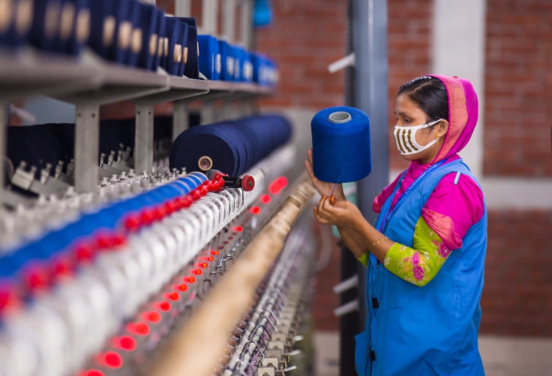 Industrial textile factory worker on the production floor