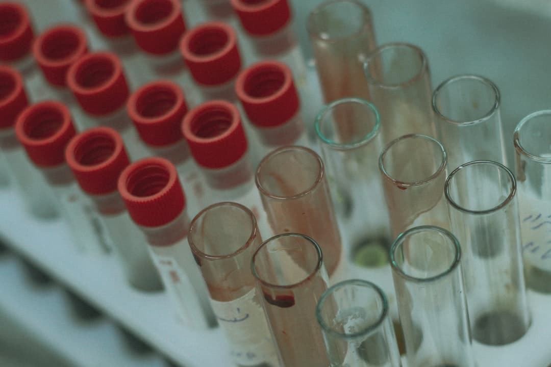 Researcher in a lab coat at a science facility