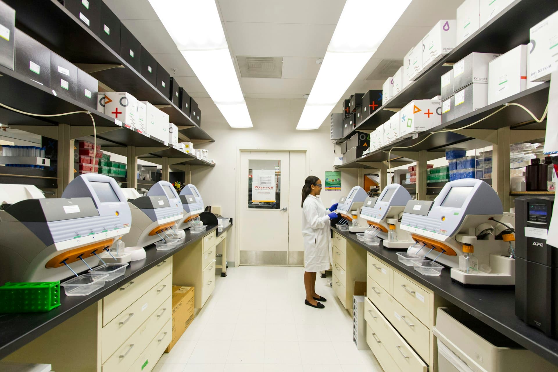 Laboratory glassware lined up on a bench